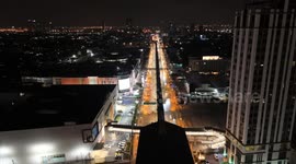Thailand: Drone footage of the BTS station next to the Train Night Market in Bangkok