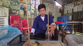 Grandfather, 67, makes brooms from recycled plastic in Thailand