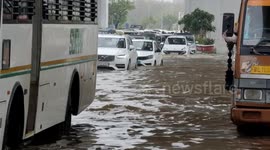 Heavy Rain In Delhi-NCR, Roads Flooded, Car Submerged, Traffic Crawls,One dead after roof collapses at Delhi airport