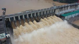 China: Flood Discharge at Shuikou Hydropower Station in Fujian