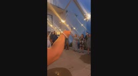 Groom Drops Bride Attempting Dip Kiss