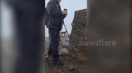 Quad amputee, 11, climbs 2,280ft mountain to raise money for others