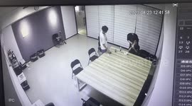 Chinese office worker lands perfect bottle flip with friends