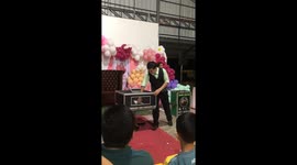Magician stuns birthday party guests with surprise snake trick