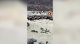 Fire brigade rescues devotees trapped in rising waters in northern India
