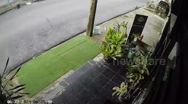 Pick up truck crashes in front of shops in Thailand