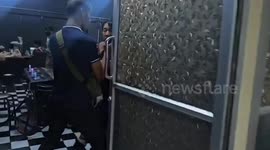 Police raid illegal casino hidden under shopping mall where 'world's saddest gorilla' lives
