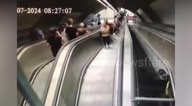 Commuters sent sprawling down stairway as escalator switches direction