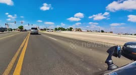 Biker Ejects After Hitting Stopped Trailer