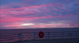 Stunning pink sunset seen at Kent beach, UK