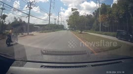 Motorcycle rider wiggles as he tries to avoid crashing