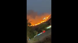 Moreno Valley California Fire starts from Illegal Fireworks people being evacuated from homes and apartments. Fire spread quickly before firefighters arrived.