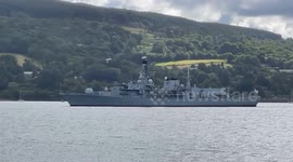 HMS Iron Duke heading to Faslane Submarine Base on the Gare Loch in Scotland
