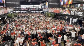 English football fans at Wembley Boxpark sing along to 'Three Lions' before England take on Switzerland in the quarter final of Euros 2024