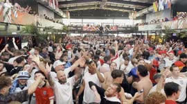 England football fans at Wembley Boxpark sing Sweet Caroline and celebrate England's victory over Switzerland in the Euros 2024 Quarter Final