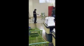 Construction crew uses a flame thrower in the middle of a supermarket in Las Vegas