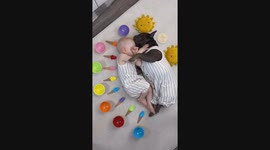 French Bulldog and baby dressed in summer matching outfits are sleeping together in different poses with lots of ice cream