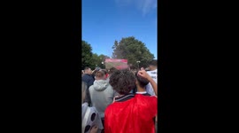 'Carnage' as England fans throw drinks into air ahead of gig in Rotherham