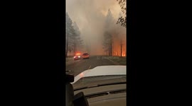 Wildland Firefighter Drives Through Intense Flames