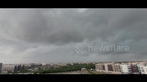 Ciclon Delia covered St Petersburg with the dark sky, Russia