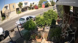 Vehicle Collision Caught on Security Camera