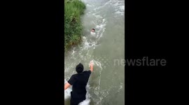 Heroic retired soldier dives into raging river to save drowning boy in China
