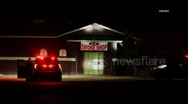 USA: Pursuit Suspect Barricades in Smoke Shop