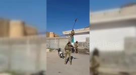 Syria: Al-Nusra Front Members Lower Turkish Flag in Idlib