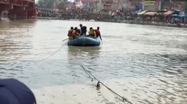India: Heavy rains in northern India cause vehicles to be swept away in Ganga River, SDRF rescues four