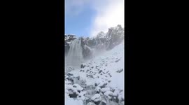 Frozen cascades: rare snowfall freezes waterfall in Neuquén, Argentina