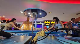 Arcade goer spots shifty local steal her phone... then bravely catches him