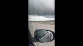 Double water spouts near Twin Span Bridge, New Orleans