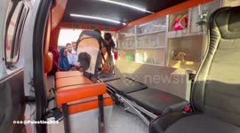 The Palestine Red Crescent teams transport injured people to the Indonesian Hospital