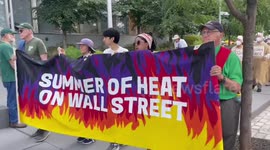 USA: Climate activists led by Bill McKibben lead a funeral procession at Citibank