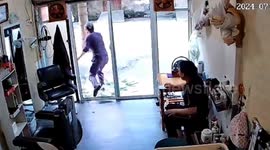 Chinese man smashes glass door chasing prankster driving off in his gas-filled vehicle