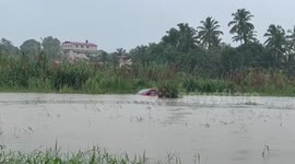 India: Rescuers save car trapped in flood amidst heavy rains