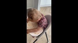 Dinner time mess: Little girl's lasagna battle leaves her covered in sauce