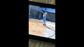 Little boy playing with hose gets a SPLASHING surprise