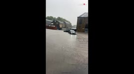 Cars soaked in floodwater during intense flooding in Bradford