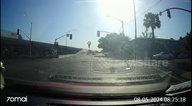 Driver Gets Hit By Red-Light-Running Car
