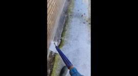 Satisfying process of revitalizing a balcony's white floor with power washing