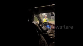Traffic police amused by driverless car encounter during breath test in China