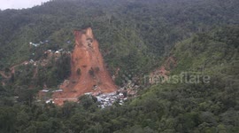 Aerial view of the location of the Big Landslide at the Gold Mine which resulted in 23 people in Indonesia being buried by landslides