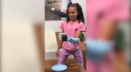 Girl born without hand gets Princess Tiana bionic arm at Disney World