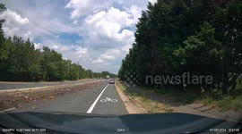 Garbage Truck Leaves Trash Strewn All Over Road