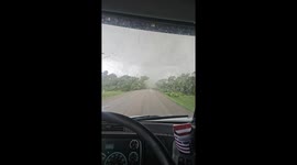 Driver Gets Caught In Tornado's Path