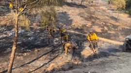 Fire Crews mopping up near Neverland Ranch and Midland School