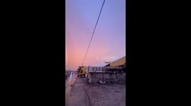 Magical moment plane lands under double rainbow