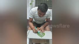 Sand artist in Northern India paid a unique tribute through his art on Peepal leaves