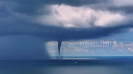Giant waterspout spotted above sea in southern China